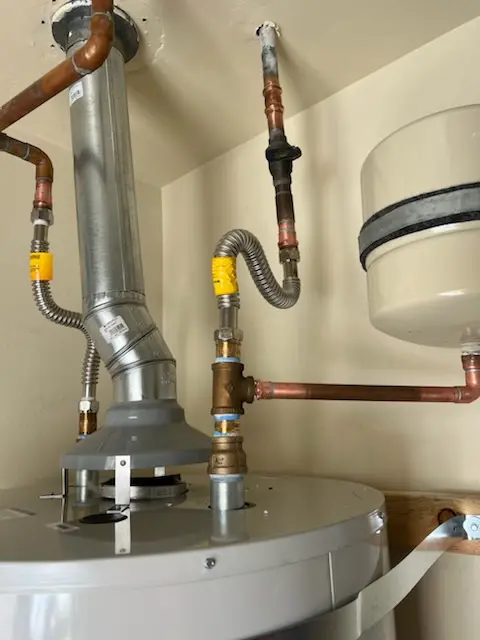 Water heater installation and plumbing repair in Griesmer Addition